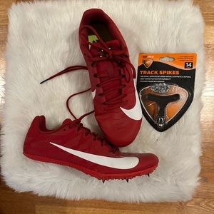 Red track shoes with spikes!